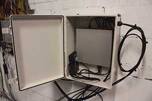 cabinet with router and other networking gear